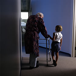 Elder walking with child